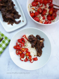 BRAISED PORK HEART WITH GARLIC AND TOMATO SALAD